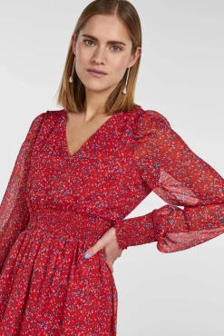Vestido Corto De Manga Larga Y Con Estampado.